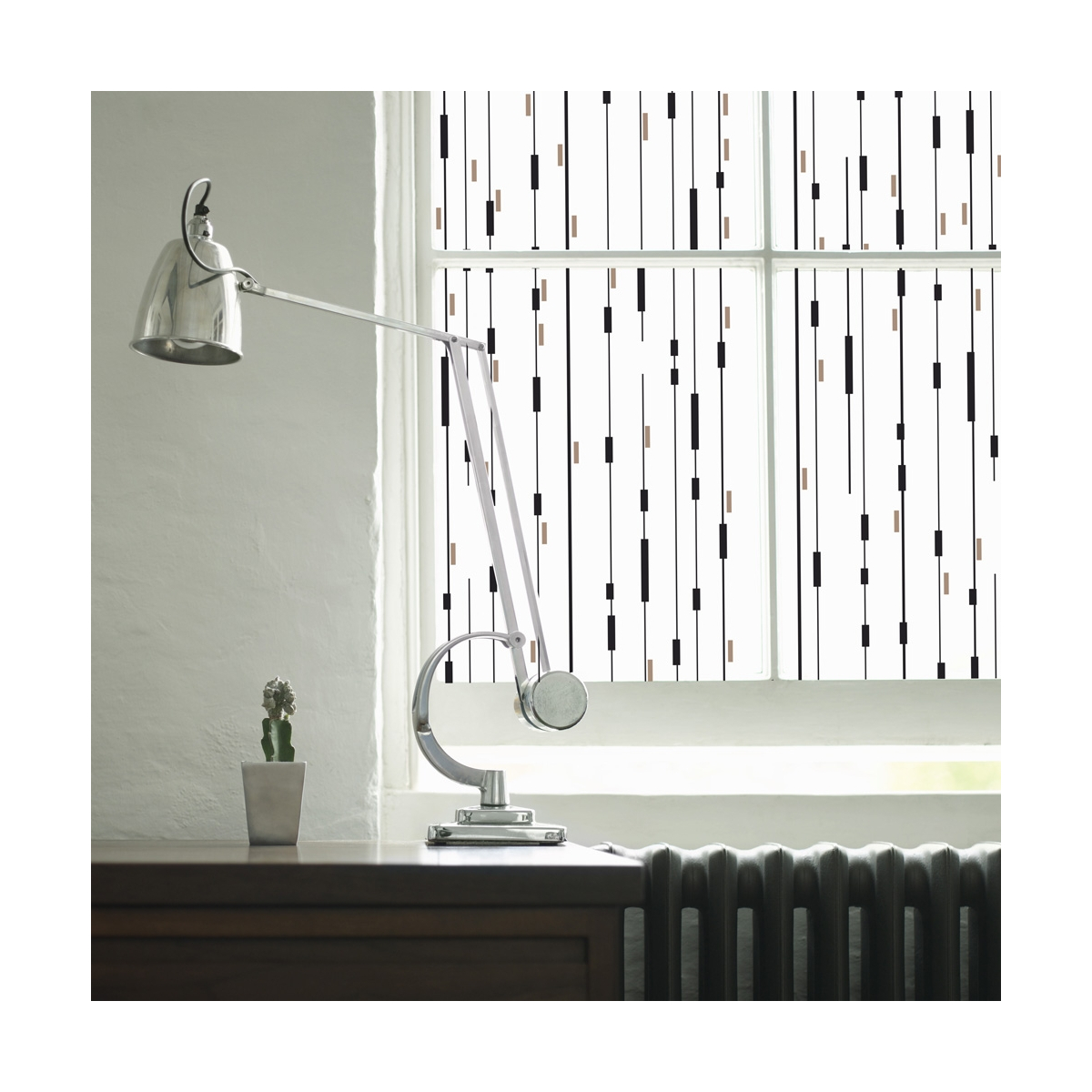 Película para ventanas con hilos gráficos